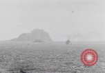 Image of US Warships fire guns at Corregidor Philippines, 1945, second 5 stock footage video 65675063916