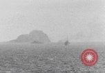 Image of US Warships fire guns at Corregidor Philippines, 1945, second 7 stock footage video 65675063916