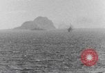 Image of US Warships fire guns at Corregidor Philippines, 1945, second 12 stock footage video 65675063916