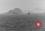 Image of US Warships fire guns at Corregidor Philippines, 1945, second 14 stock footage video 65675063916
