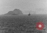 Image of US Warships fire guns at Corregidor Philippines, 1945, second 16 stock footage video 65675063916