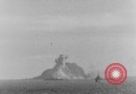 Image of US Warships fire guns at Corregidor Philippines, 1945, second 24 stock footage video 65675063916