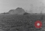 Image of US Warships fire guns at Corregidor Philippines, 1945, second 28 stock footage video 65675063916