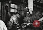 Image of workers in butchery United States USA, 1919, second 4 stock footage video 65675063928