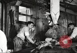 Image of workers in butchery United States USA, 1919, second 8 stock footage video 65675063928