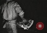 Image of workers in butchery United States USA, 1919, second 11 stock footage video 65675063928