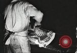 Image of workers in butchery United States USA, 1919, second 13 stock footage video 65675063928