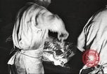 Image of workers in butchery United States USA, 1919, second 15 stock footage video 65675063928