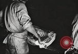 Image of workers in butchery United States USA, 1919, second 16 stock footage video 65675063928