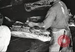 Image of workers in butchery United States USA, 1919, second 20 stock footage video 65675063928