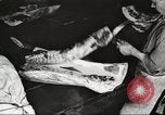Image of workers in butchery United States USA, 1919, second 25 stock footage video 65675063928