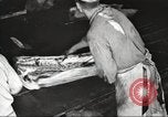 Image of workers in butchery United States USA, 1919, second 27 stock footage video 65675063928