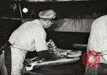 Image of workers in butchery United States USA, 1919, second 32 stock footage video 65675063928