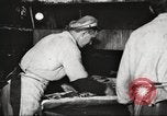 Image of workers in butchery United States USA, 1919, second 38 stock footage video 65675063928
