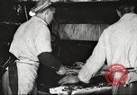 Image of workers in butchery United States USA, 1919, second 39 stock footage video 65675063928