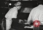 Image of workers in butchery United States USA, 1919, second 40 stock footage video 65675063928