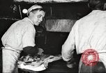 Image of workers in butchery United States USA, 1919, second 41 stock footage video 65675063928