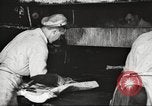 Image of workers in butchery United States USA, 1919, second 43 stock footage video 65675063928