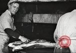 Image of workers in butchery United States USA, 1919, second 44 stock footage video 65675063928