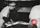 Image of workers in butchery United States USA, 1919, second 46 stock footage video 65675063928