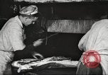 Image of workers in butchery United States USA, 1919, second 47 stock footage video 65675063928
