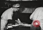 Image of workers in butchery United States USA, 1919, second 48 stock footage video 65675063928