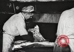 Image of workers in butchery United States USA, 1919, second 49 stock footage video 65675063928