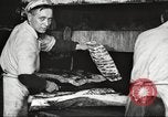 Image of workers in butchery United States USA, 1919, second 51 stock footage video 65675063928