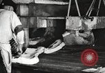 Image of workers in butchery United States USA, 1919, second 58 stock footage video 65675063928
