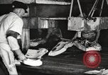 Image of workers in butchery United States USA, 1919, second 59 stock footage video 65675063928