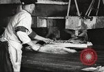 Image of workers in butchery United States USA, 1919, second 60 stock footage video 65675063928