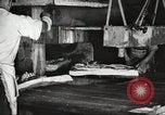 Image of workers in butchery United States USA, 1919, second 61 stock footage video 65675063928