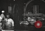 Image of workers in butchery United States USA, 1919, second 15 stock footage video 65675063930