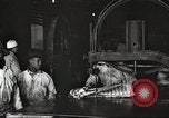 Image of workers in butchery United States USA, 1919, second 16 stock footage video 65675063930