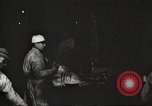 Image of workers in butchery United States USA, 1919, second 21 stock footage video 65675063930