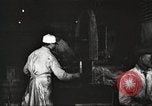 Image of workers in butchery United States USA, 1919, second 30 stock footage video 65675063930