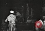 Image of workers in butchery United States USA, 1919, second 31 stock footage video 65675063930