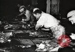 Image of workers in butchery United States USA, 1919, second 37 stock footage video 65675063930