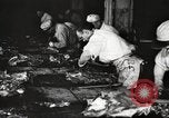 Image of workers in butchery United States USA, 1919, second 38 stock footage video 65675063930