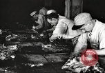 Image of workers in butchery United States USA, 1919, second 41 stock footage video 65675063930