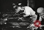 Image of workers in butchery United States USA, 1919, second 46 stock footage video 65675063930