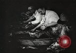 Image of workers in butchery United States USA, 1919, second 47 stock footage video 65675063930
