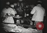 Image of workers in butchery United States USA, 1919, second 14 stock footage video 65675063931