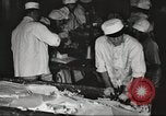 Image of workers in butchery United States USA, 1919, second 16 stock footage video 65675063931