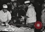 Image of workers in butchery United States USA, 1919, second 18 stock footage video 65675063931