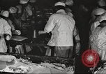 Image of workers in butchery United States USA, 1919, second 19 stock footage video 65675063931