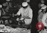 Image of workers in butchery United States USA, 1919, second 20 stock footage video 65675063931