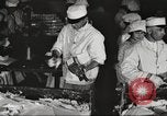 Image of workers in butchery United States USA, 1919, second 22 stock footage video 65675063931