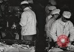 Image of workers in butchery United States USA, 1919, second 23 stock footage video 65675063931