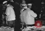 Image of workers in butchery United States USA, 1919, second 25 stock footage video 65675063931